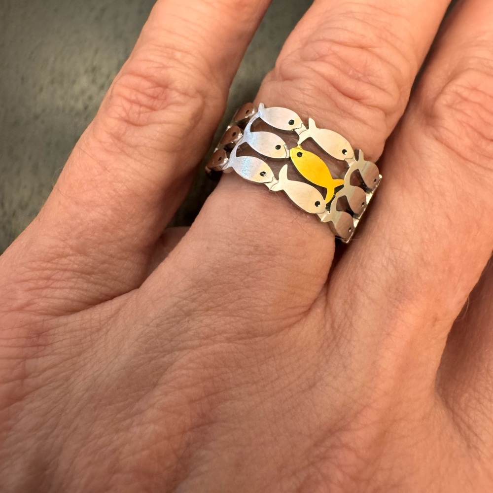 Sterling silver-look with gold-tone fishies ring.  Size 7 BUT adjustable.